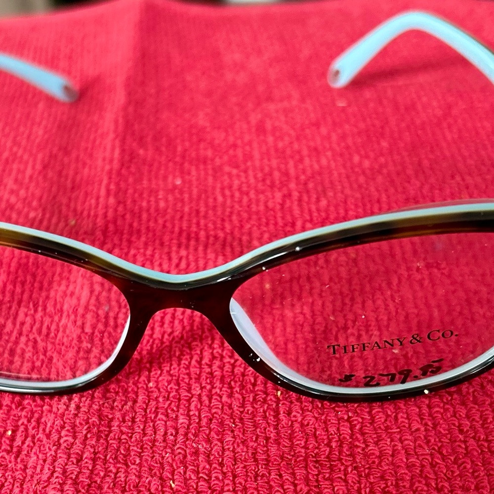 Tiffany & Co eyeglass or sunglasses frames and box with accessories.